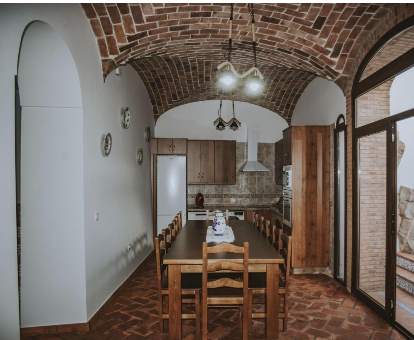 Foto de Casa Rural Los Bellosos donde se ve su comedor interior