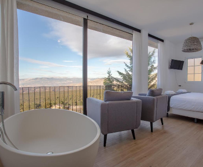 Foto de hermoso jacuzzi en la habitacion del Hotel El Balcon de las Nieves