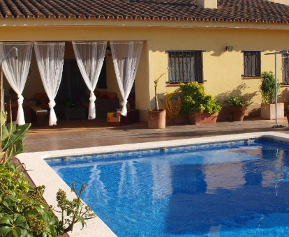 Foto del área de la piscina en la parte trasera de Villa Ca la Vicen
